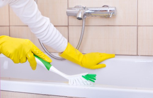 Upholstery cleaning service in Fulham treating stains on a modern living room sofa